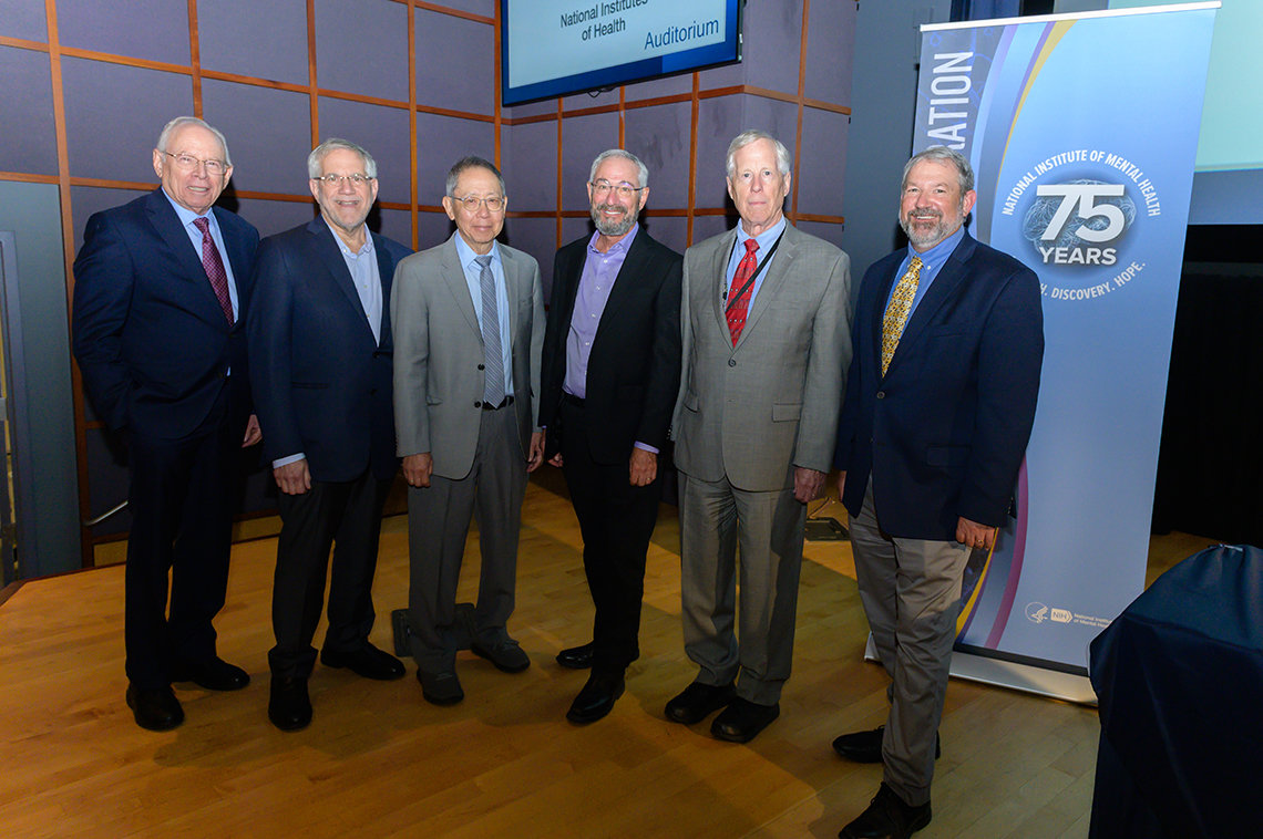 A group photo featuring former and current NIMH directors 