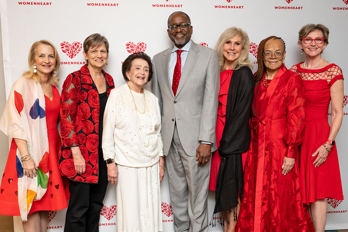A group photo featuring Gibbons and other honorees