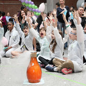 Kids of all ages enjoy a controlled bubbly explosion conducted by the Science Guys of Baltimore at the FAES Science Fair on the FAES terrace. PHOTO: CHIA-CHI CHARLIE CHANG