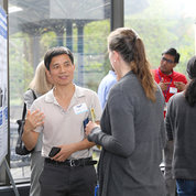 Dr. Jimmy Jin of NLM discusses his poster at the NLM open house. PHOTO: CHIA-CHI CHARLIE CHANG