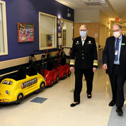 Adm. Rachel Levine, assistant secretary for health at the Department of Health and Human Services and head of the Public Health Service Commissioned Corps, with NIH acting director Dr. Lawrence Tabak, tours a Clinical Center pediatric unit during a visit to NIH on June 22. PHOTO: CHIA-CHI CHARLIE CHANG