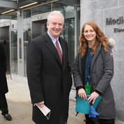 U.S. Sen. Chris Van Hollen (c) and NIH acting principal deputy director Dr. Tara Schwetz pause for a photo at the Medical Center Metro station, as Montgomery County Executive Marc Elrich (l) looks on. PHOTO: CHIA-CHI CHARLIE CHANG