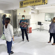 Working group members toured I-HAB. Shown are (from l) McAllister; Dr. Sudha Srinivasan of NIAID; Stacey Chambers of NINDS; and IHVN’s Petronilla Nwadike and Dr. Alash’le Abimiku. PHOTO: BONNIE JOUBERT