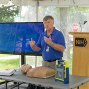 A demonstration, “Workplace Emergency Response to Sudden Cardiac Arrest,” is presented by a Division of Occupational Health and Safety CPR Training Program representative. PHOTO: MARLEEN VAN DEN NESTE