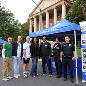 Gathering for Bike Day are (from l) Sean Cullinane, Gerald Jordan, Joe Cox, Tammie Edwards, NIH Deputy Director for Management Dr. Alfred Johnson and two NIH police officers Kerin Cummings and Matt Mehlhaff. PHOTO: CHIA-CHI CHARLIE CHANG