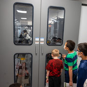 Kids enjoyed watching the XR2 robot at work in the CC pharmacy. PHOTO: Leslie Kossoff.
