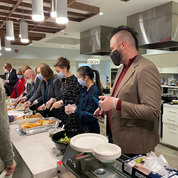 The guest servers volunteer as part of the inn’s Family Dinner Program.