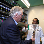 McAuliffe gets an up-close look at NIH’s zebrafish research with Bishop. PHOTO: CHIA-CHI CHARLIE CHANG

